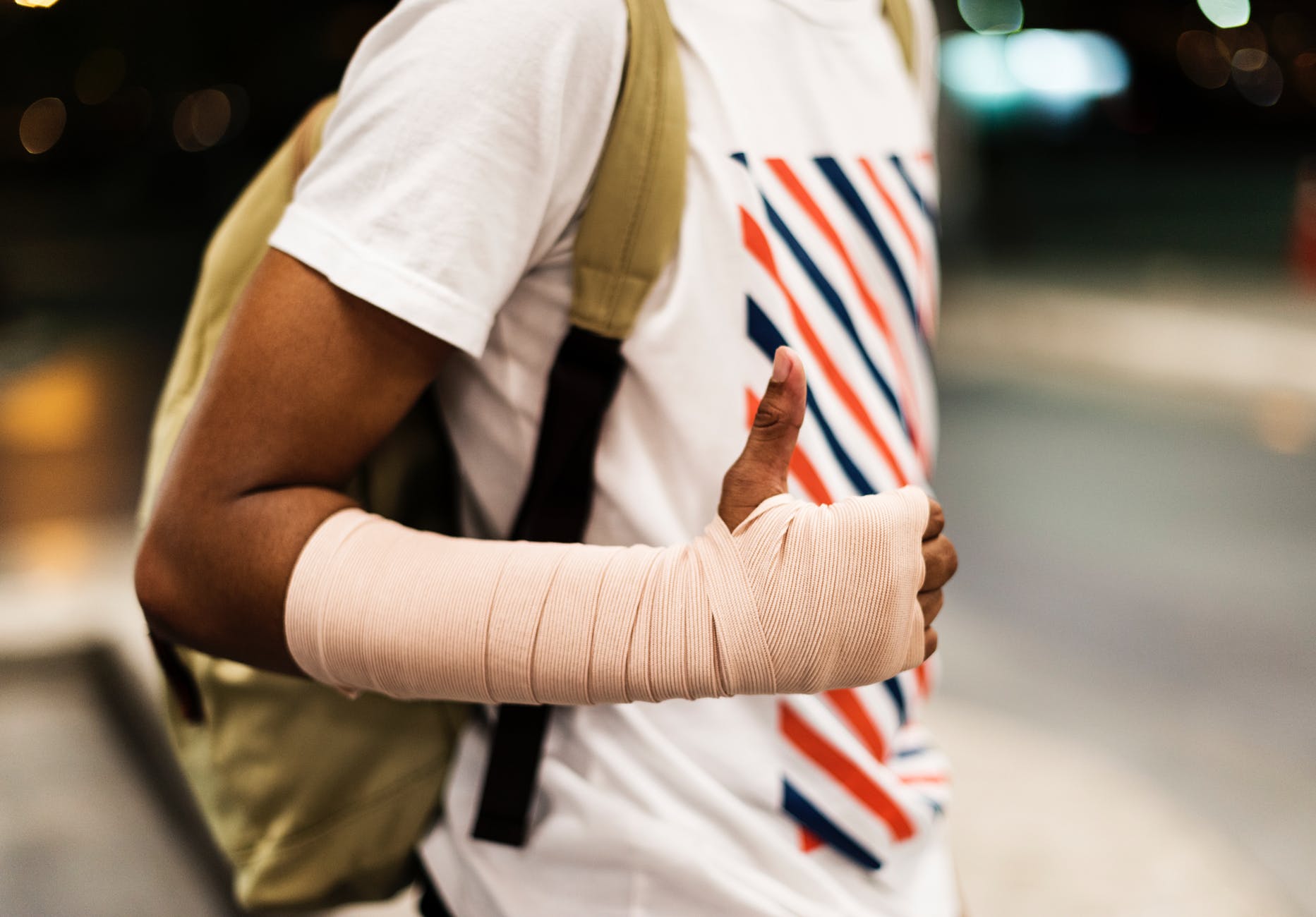 man carrying backpack