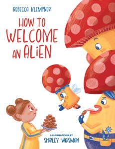Cover of HOW TO WELCOME AN ALIEN shows a little girl with pigtails offering cookies to three aliens shaped like mushrooms.